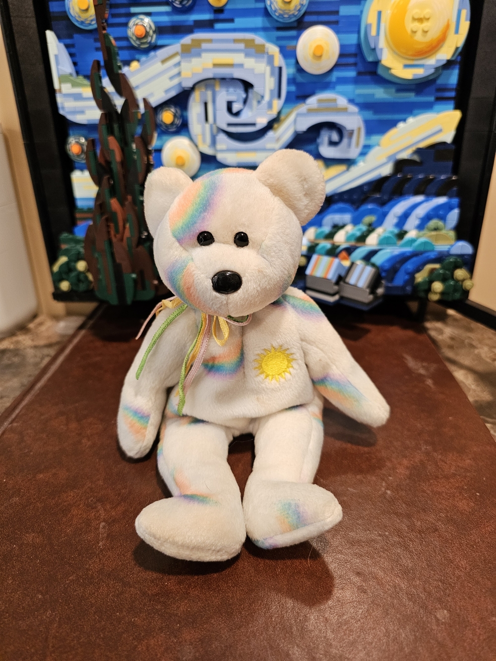 Ty Beanie Baby Cheery the Sunshine Bear with rainbow tie-dye fur